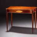 View the image: Serpentine Side Table